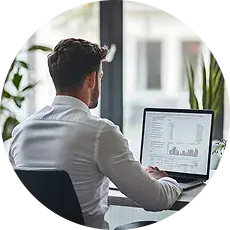 A CDB team member working at a desk