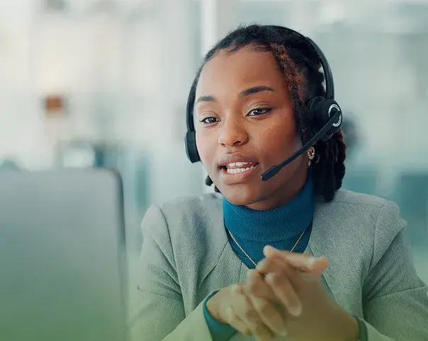 A CDB support representative wearing a headset