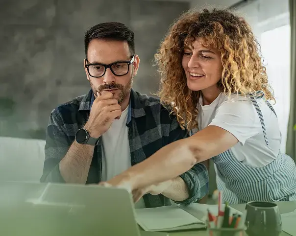 Two people reviewing a claim together