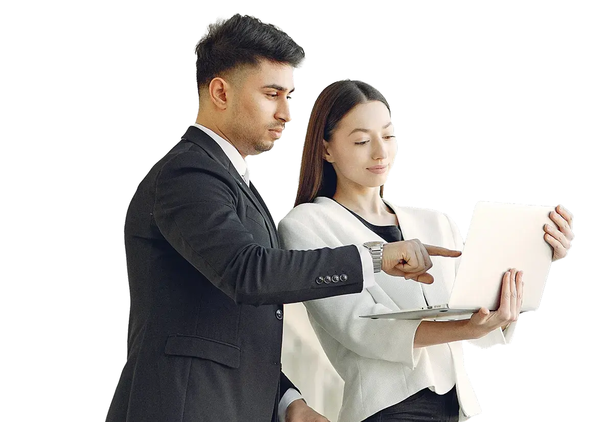 Two CDB colleagues reviewing health plan strategy on a laptop